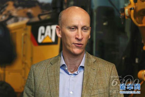 5月25日,卡特彼勒中国事务总裁鲍勃·德朗热(中文名“杜乐谦”)在美国伊利诺伊州皮奥里亚的卡特彼勒博物馆内